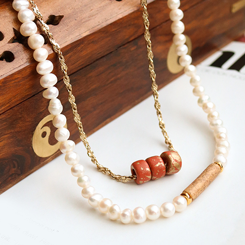 Confectionner des bijoux tendance avec les perles en c&eacute;ramique DQ grecque gold spot