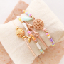 Ces bijoux ont &eacute;t&eacute; confectionn&eacute;s avec la collection estivale de m&eacute;tal DQ :