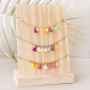 Vous pouvez confectionner ces bijoux avec notre toute nouvelle collection de pompons : 