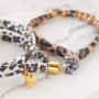 Fabriquez de jolis bracelets et des &eacute;lastiques &agrave; cheveux avec des rubans &eacute;lastiques cousus imprim&eacute; l&eacute;opard :