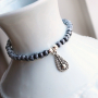 Voici comment confectionner des bracelets robustes pour hommes avec des perles en verre et des perles h&eacute;matites :