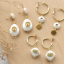 Lancez-vous et cr&eacute;ez des bijoux tendance avec les articles en coquillage nacr&eacute; combin&eacute;s avec des &eacute;l&eacute;ments en laiton zirconium. 