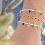 D&eacute;couvrez ici comment confectionner des bijoux tendance avec des perles, des breloques et des connecteurs arc-en-ciel en m&eacute;tal DQ 