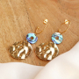 Bijoux estivaux avec des pendentifs coquillage