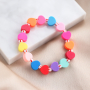 Bijoux de la Saint-Valentin avec perles en polym&egrave;re color&eacute;es