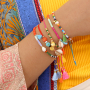 Comment incorporer des pompons aux bracelets et aux lani&egrave;res &agrave; lunettes ?