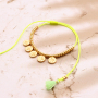 Comment incorporer des pompons aux bracelets et aux lani&egrave;res &agrave; lunettes ?