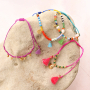 Comment incorporer des pompons aux bracelets et aux lani&egrave;res &agrave; lunettes ?