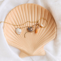 Soyez cr&eacute;atif avec de grands pendentifs coquillage