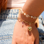 Cr&eacute;ez des colliers et des bracelets enjou&eacute;s avec des breloques en forme de coeur en acier inoxydable