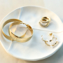 Inspiration avec des boucles d'oreilles en acier inoxydable