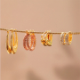 Mix & match avec notre collection de boucles en acier inoxydable